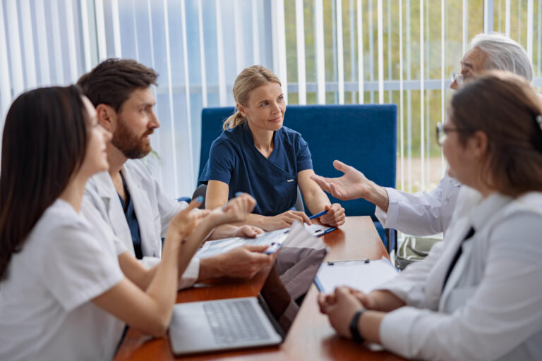Successful medical doctors are discussing diagnosis during the conference